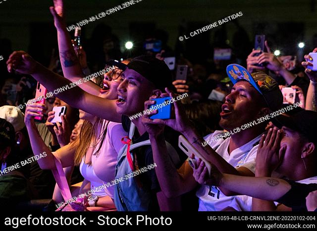 Inhabitants of Pasto along with tourists sing and enjoy the opening night rock concert at the Carnival of Blancos Y Negros on January 2, 2022 in Pasto - Nariño