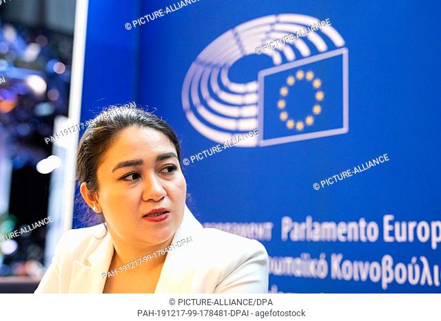 17 December 2019, France (France), Straßburg: The daughter of Uighur activist Ilham Tohti, Jewher Ilham, sits in the European Parliament building during an...