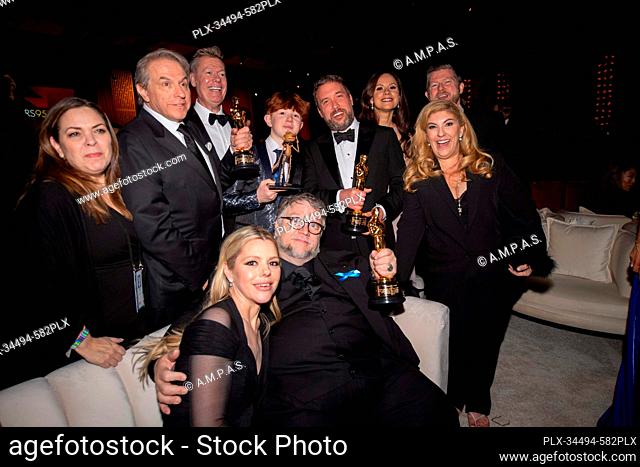 Oscar® winners Gary Ungar, Guillermo del Toro and Alex Bulkley attend the Governors Ball following the live ABC telecast of the 95th Oscars® at the Dolby®...