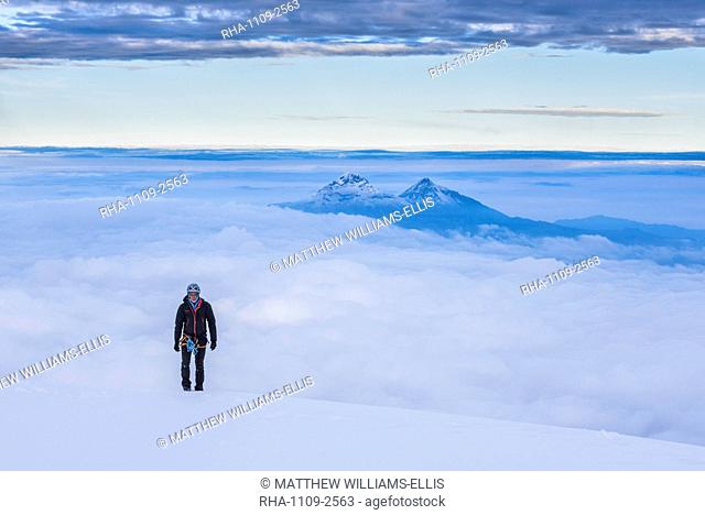Climber on final 20m to the 5897m summit of Cotopaxi Volcano, Cotopaxi Province, Ecuador, South America