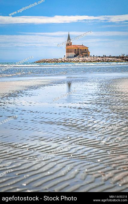 Italy, Veneto, province of Venice, city of Caorle, the church of Our Lady of the Angel seen from the beach of Levante