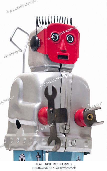 Vintage retro red face tin toy robot isolated on a white background