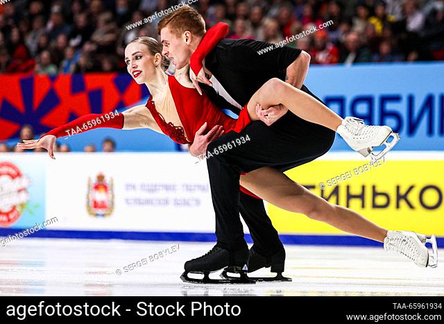 RUSSIA, CHELYABINSK - DECEMBER 21, 2023: Pair skaters Natalya Khabibullina and Ilya Knyazhuk perform during a pairs' short programme event as part of the 2024...