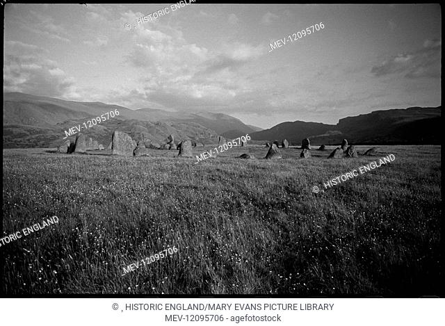 View of the Castlerigg Stone Circle, looking south-east and showing the whole main circle of stones, and a partial view of a smaller rectangular-shaped...