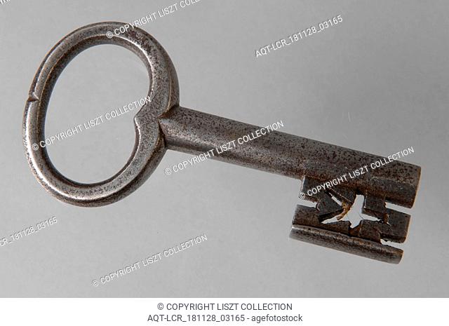 Iron key with heart-shaped eye, hollow key handle and cruciform beards in beard, key iron value soil find?, hand forged Key with heart-shaped eye (handle) with...