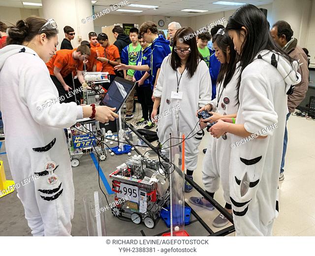 Teenagers from Francis Lewis High School High School test their robot during a break at the FIRST Tech Challenge Regional Championship held at NYU-Polytechnic...