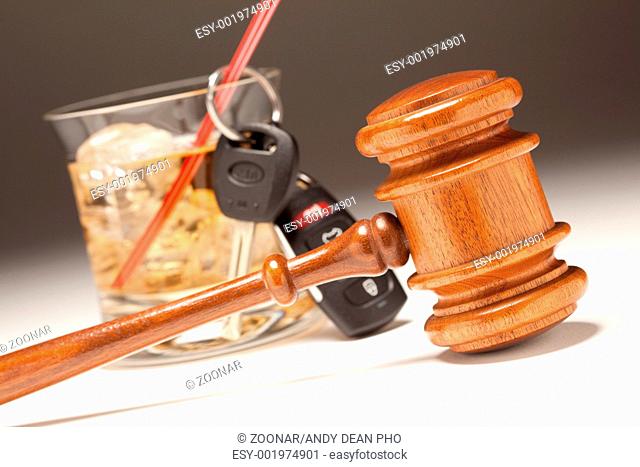 Gavel, Alcoholic Drink & Car Keys on a Gradating to White Background - Drinking and Driving Concept