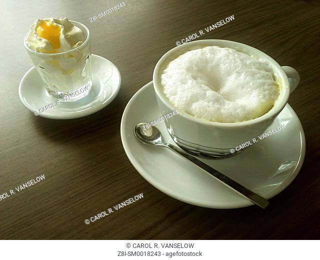 In Limburg, most cafes serve your cappuccino with a little whipped cream and a dollop of Advocaat (a liquer made from eggs)