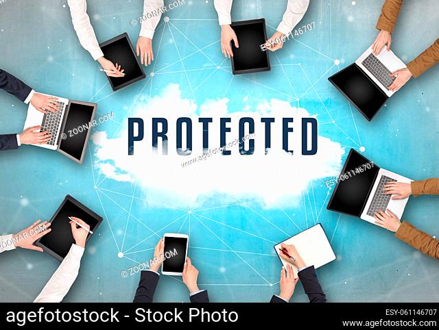 Group of people having a meeting with PROTECTED insciption, web security concept