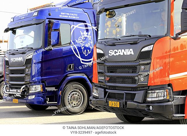 LIETO, FINLAND - APR 12, 2018: New Scania trucks, R730 and orange R650 XT on Scania Tour 2018. On Feb 18, 2019, Scania celebrates 70 years in Finland