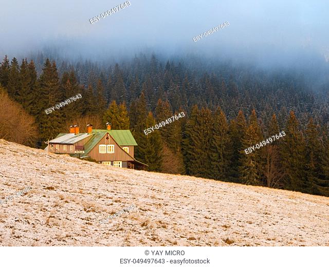Typical czech mountain hut in autumn time