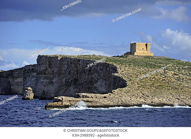 St Mary's Tower on Comino Island seen from the ferry to Gozo Island, Malta, Mediterranean Sea, Southern Europe