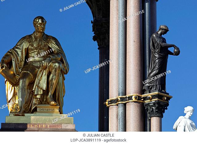 England, London, South Kensington. Statue of Prince Albert seated in the centre of the Albert Memorial. The memorial was commissioned by Queen Victoria in...