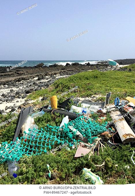 Jetsam including plastic bottles, synthetic nets, foam and other rubbish lies washed up on Orzola beach on the island of Lanzarote, Spain, 19 March 2017