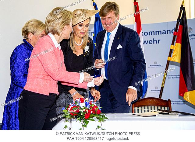 King Willem-Alexander and Queen Maxima of The Netherlands visit a military meeting about cooperation between the Dutch and German army with Defense Ministers...