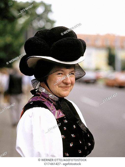 Germany, Gutach (Schwarzwaldbahn), Gutach (river), Gutach Valley, Black Forest, Baden-Wuerttemberg, senior woman in Bollenhut traditional costumes, clothes