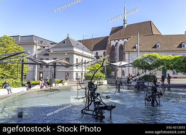 Tinguely's Carnival Fountain or Fasnachtsbrunnen at Theaterplatz and Elisabethen church in Basel, Switzerland, Europe