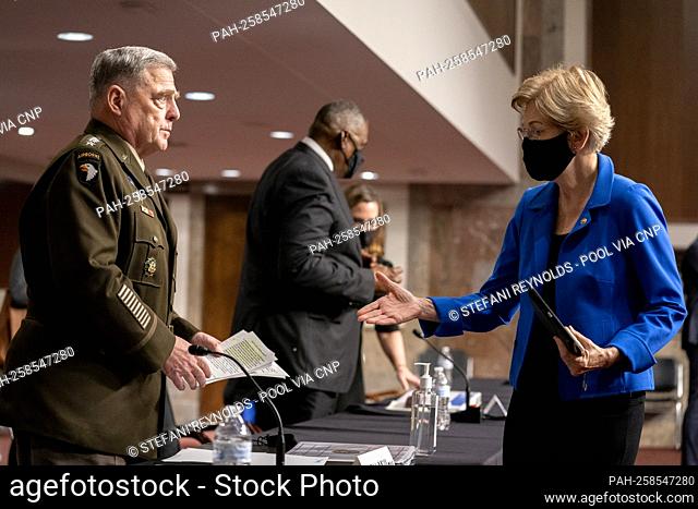 United States Senator Elizabeth Warren (Democrat of Massachusetts), right, speaks to U.S. Army General Mark A. Milley, Chairman of the Joint Chiefs of Staff