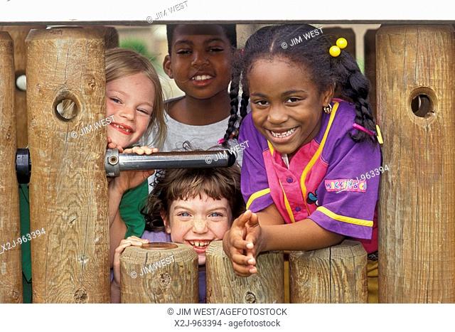 Detroit, Michigan - Elementary school children on the playground at Friends School in Detroit  MR