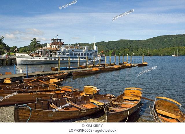 England, Cumbria, Bowness on Windermere , A pleasure boat and rowing boats for hire on Lake Windermere