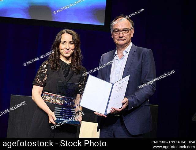21 June 2023, Berlin: Dunja Ramadan (Süddeutsche Zeitung, l) receives the Theodor Wolff Award in the Opinion category for ""The Garden and the Jungle"" while...