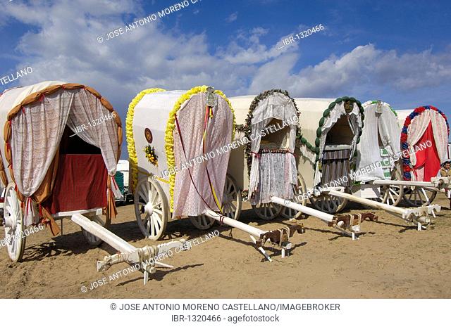 Typical carriages at El Rocio village, Romería, pilgrimage, to El Rocío, Almonte, Huelva province, Andalucia, Spain, Europe