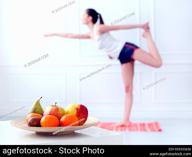 Lifestyle. Cute, attractive woman during yoga exercise