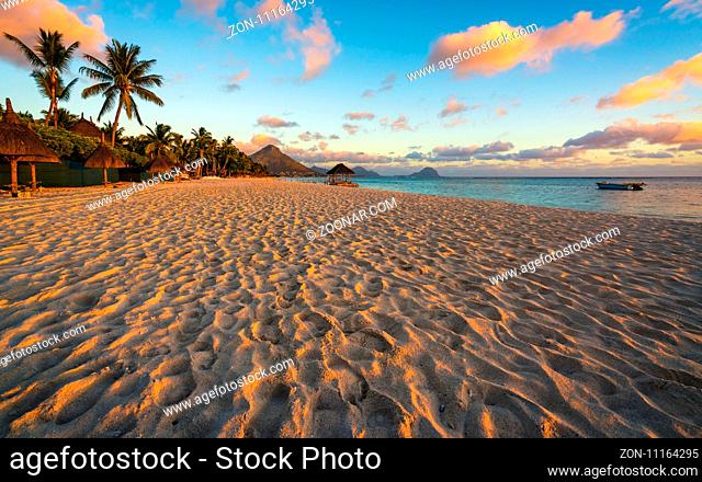 Flic and flac beach at sunset in Mauritius island