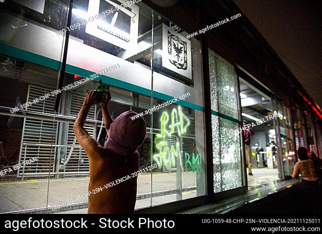 Radical feminist groups break windows of a Transmilenio bus stop during the International Day for the Elimination of Violence against Women demonstrations in...