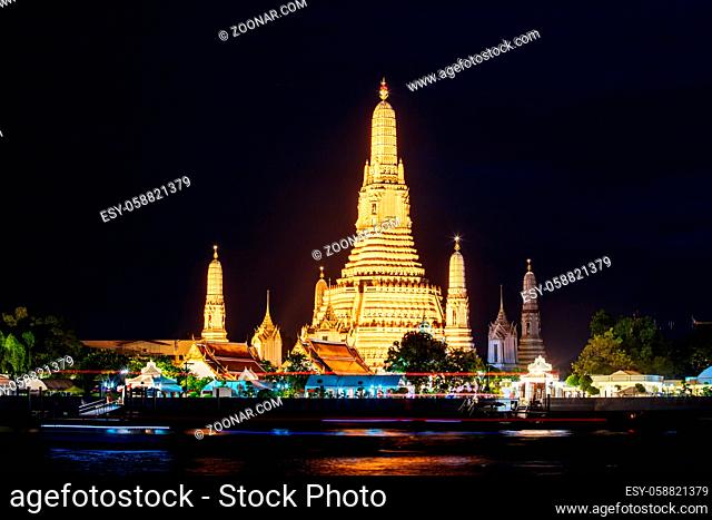 Bangkok, Thailand - April 25 2018: Wat Arun as seen from across the Chao Phraya River in early evening
