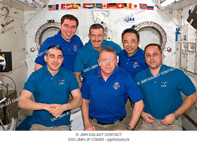 Expedition 2829 and Expedition 2930 crew members pose for a group portrait in the International Space Station's Kibo laboratory following the ceremony of...