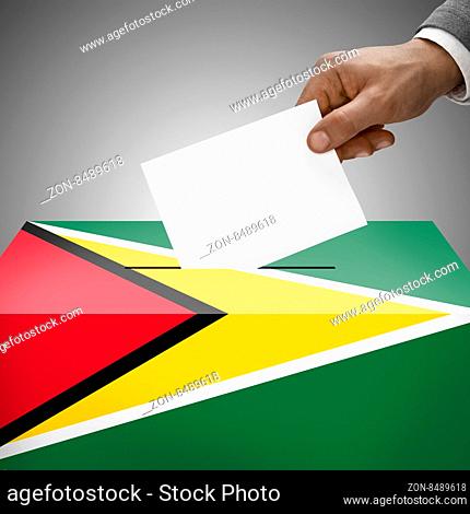 Ballot box painted into national flag colors - Guyana