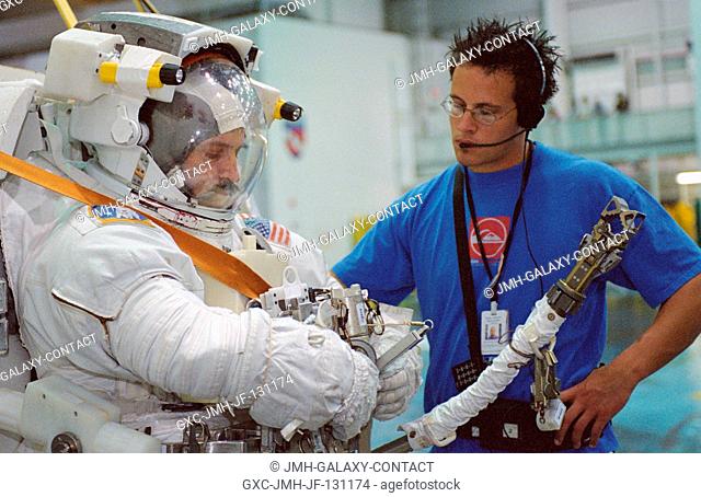 Cosmonaut Alexander Y. Kaleri, Expedition 8 flight engineer, attired in a training version of the Extravehicular Mobility Unit (EMU) space suit