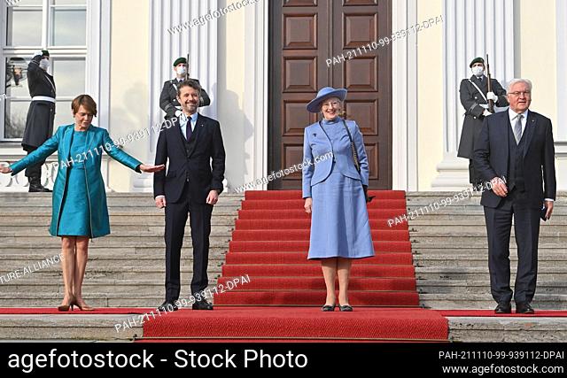 10 November 2021, Berlin: Federal President Frank-Walter Steinmeier (r) and his wife Elke Büdenbender (l) welcome Crown Prince Frederik of Denmark and Margrethe...