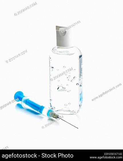 Injection syringe and sanitizer gel. Covid-19 coronavirus vaccination. Corona virus vaccine isolated on white background