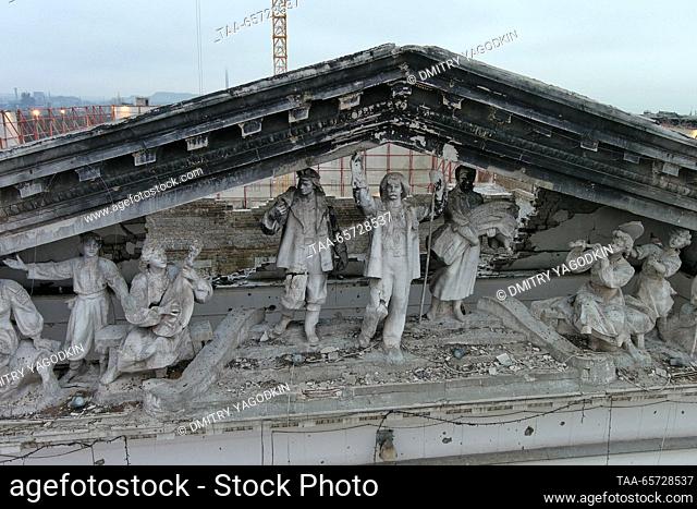 RUSSIA, DONETSK PEOPLE'S REPUBLIC - DECEMBER 13, 2023: Detail of the facade of the Donetsk Region Academic Drama Theatre which is being rebuilt in the city of...