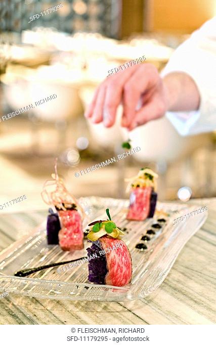 Chef Garnishing Waygu Beef