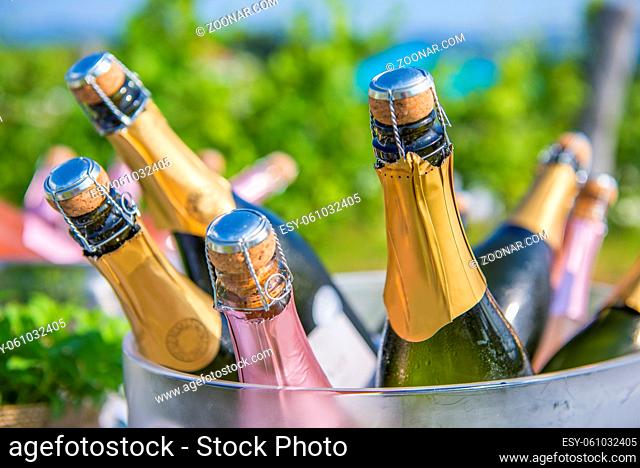 Champagne bottles waiting to be opened and served