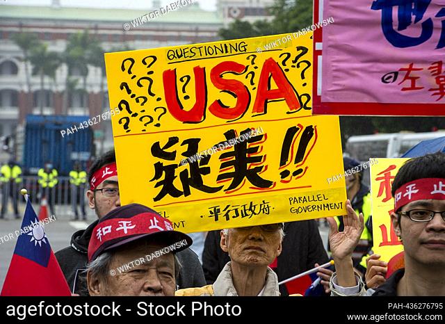 Demonstrators march along Zhongshan South Road near Liberty Square, President Office as well as Foreign Affairs Ministry in Taipei