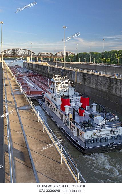 Louisville, Kentucky - The Marathon Petroleum towboat Paul G Blazer pushes oil barges through the McAlpine Lock on the Ohio River