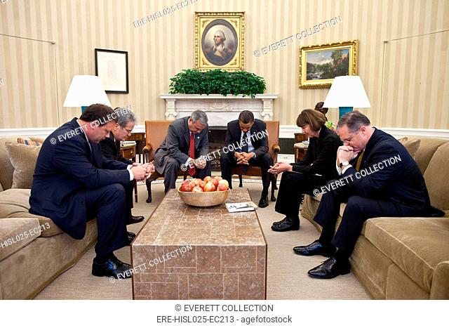 President Barack Obama prays with co-chairs of the National Prayer Breakfast in the Oval Office Jan. 27 2011. From left are Rep. Heath Shuler Rep