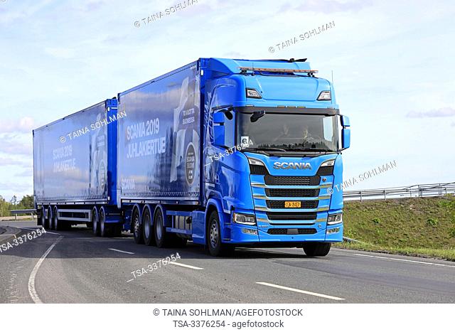 Turku, Finland. August 24, 2019. Blue Next Generation Scania S650 truck in front of full trailer in a road test. Scania in Finland 70 years tour