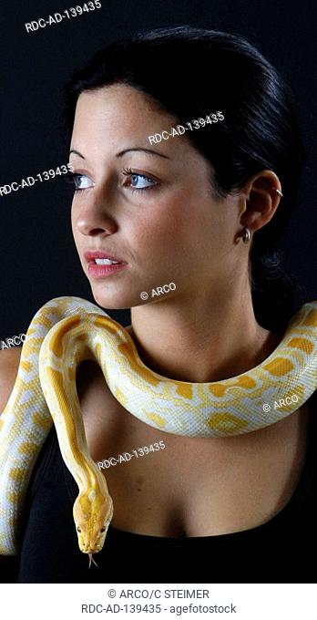 Woman with Indian Python albino Python molurus