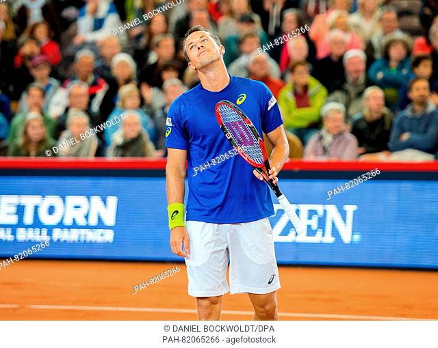 Philipp Kohlschreiber of Germany plays against Olivo of Argentina in a quarter final match during the ATP Tour - German Tennis Championships at the Am...