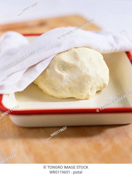 food ingredients, flour dough on a plate