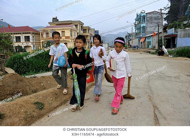 pupils on the way to school, Dong Van, Ha Giang province, northern Vietnam, southeast asia