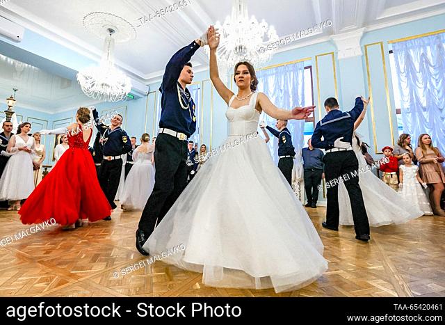 RUSSIA, SEVASTOPOL - DECEMBER 2, 2023: Couples dance during a ball held by the Yunarmiya [Young Army] Military Patriotic Movement at the Catherine Hall of the...