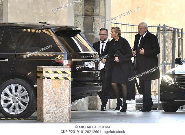 Czech singer Helena Vondrackova, center, and her husband Martin Michal, right, attend a mourning ceremony to Czech pop singer Karel Gott in St Vitus Cathedral...