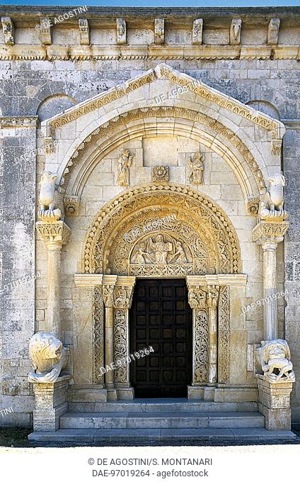 Entrance, framed by a canopy resting on column-bearing lions, Sanctuary of St Leonardo of Siponto (12th century), Manfredonia, Puglia, Italy