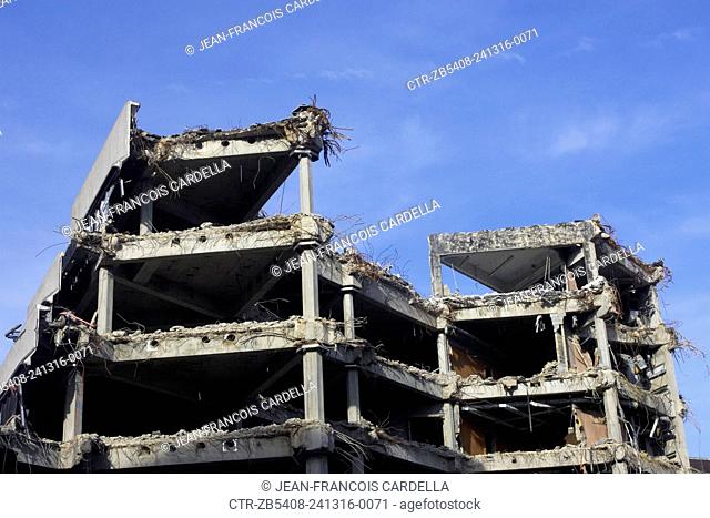 Demolition of the officially known as Greater London Council Overflow Building, Number 1 Westminster. This building was once connected to City Hall by an...